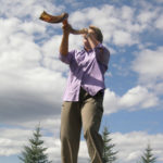 Jo Booser blowing the shofar